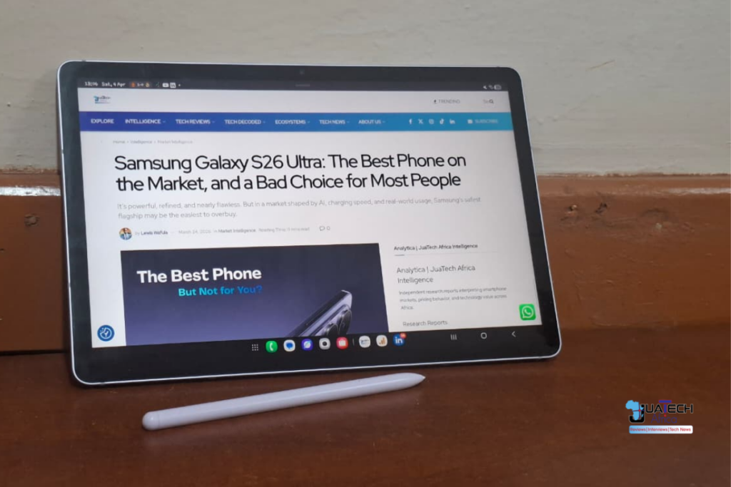 Samsung Galaxy Tab S9 FE used for reading and productivity workflow with S Pen on desk